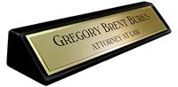 Brushed Gold Metal Name Plate with a Shiny Gold Border on an 8" Black Piano Finish Deskplate