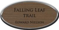 Framed Name Tag: Silver Plastic (oval) - Deep Bronze and Black Plastic Insert